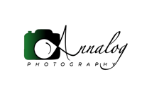 a green camera logo on a black background